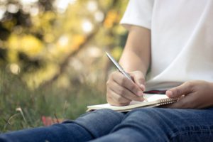 schrijven in notitieboek
